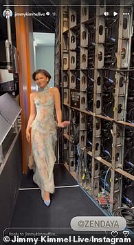 She danced around enough to reveal her baby-blue pumps hidden beneath the gorgeous dress