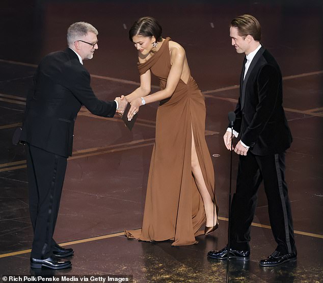 Zendaya and Robert Pattinson (R, pictured Sunday) have been hard at work promoting their roles as an engaged couple with secrets in Kristoffer Borgli's romantic dramedy The Drama, which hits US/UK theaters April 3