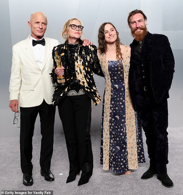 (L-R) Ed Harris, Amy Madigan, daughter Lily Harris and Lily's husband Sean on the red carpet at the Vanity Fair Oscars after-party in Hollywood on Sunday evening