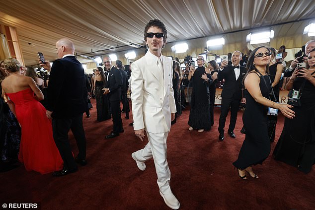 Chalamet could be seen lingering by Spielberg for several seconds before his publicist intervened