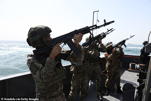 Naval units from Iran and Russia carry out joint naval drills on February 19