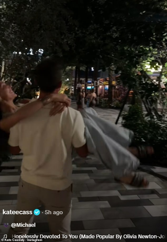 Now, Kate, 26, looked happier than as she was twirled around in the mystery mans arms prompting fans to comment she 'deserves to feel love again'