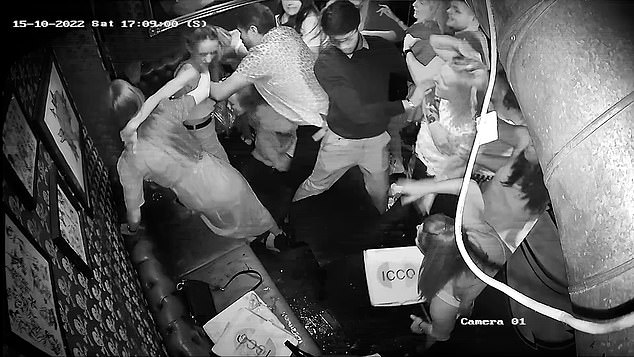 Two men tried to stop the fight halfway through but the nine women kept getting potshots at each other over behind their backs, or totally ignored them