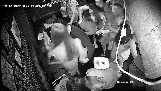 Drinks went flying as well as hands and feet