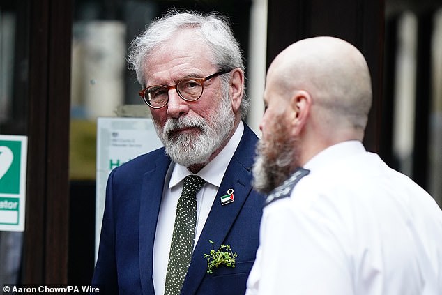 Mr Adams, wearing a shamrock in his jacket pocket, denies holding any role in the IRA and sanctioning bombings on the British mainland