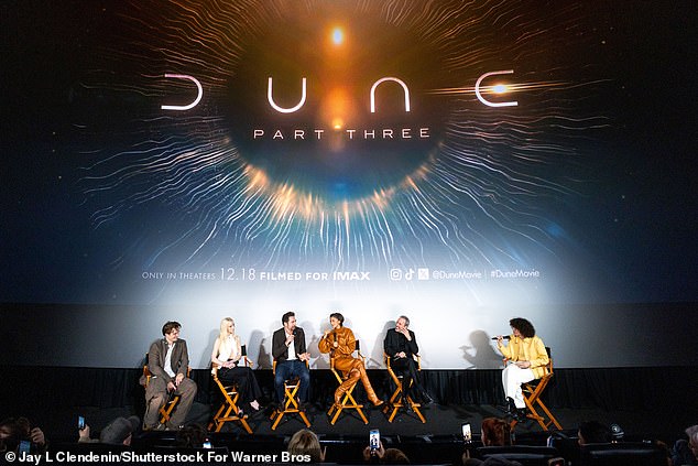 Pattinson, Taylor-Joy, Bardem, Zendaya and Villeneuve were all interviewed onstage by Reece Feldman (right) in front of the screen on which Chalamet's message was projected
