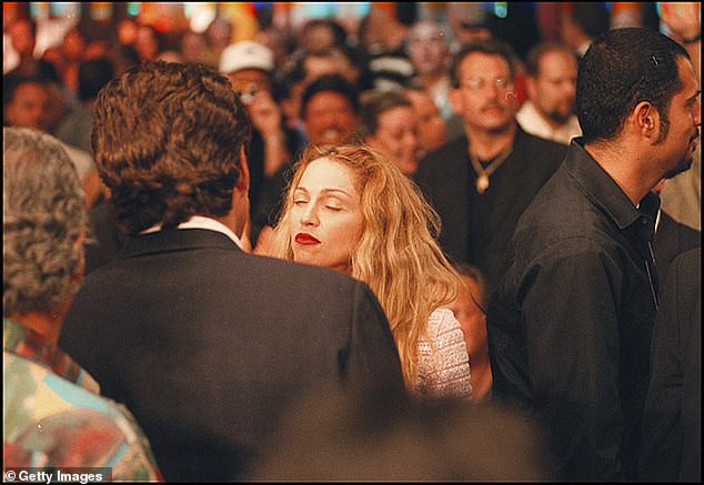 Madonna was the world's biggest pop star and Kennedy America's most eligible bachelor when they met in 1985. (Pictured together in 1997)