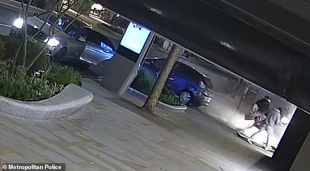 Three men ran inside to grab luxury items before fleeing in a getaway car and a motorcyle