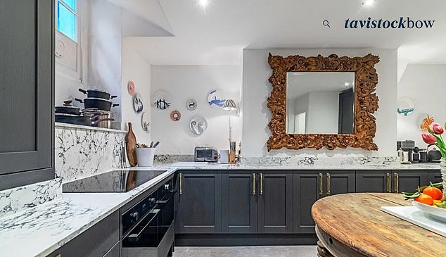 The property was renovated and fitted with a modern kitchen on the lower ground floor