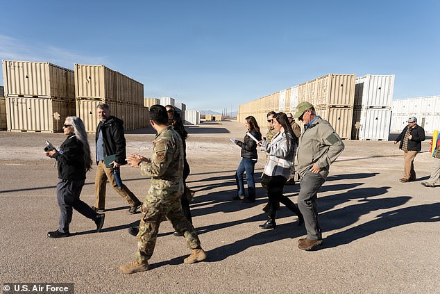 Air Force soldiers and contractors walk a section of Holloman Air Force Base on January 13, 2026