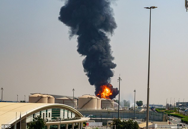 Residents have been warned against posting pictures or videos of damage. Picturedn Iranian drone hit a fuel tank near Dubai Airport, sparking a massive fire