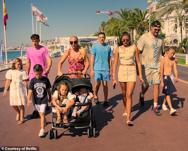 Tyson Fury pictured with his wife Paris and their eight children while away on holiday
