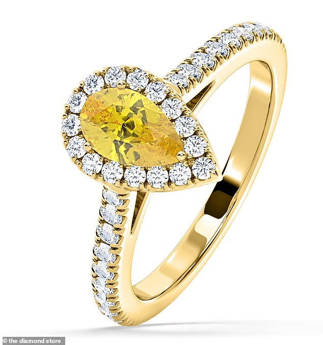 As seen on many a celebrity's hand, this sparkling ring features a pear shaped yellow diamond