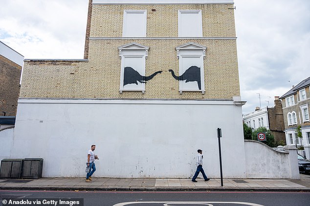 A mural by Banksy, whose identity has just been revealed, in Chelsea, west London