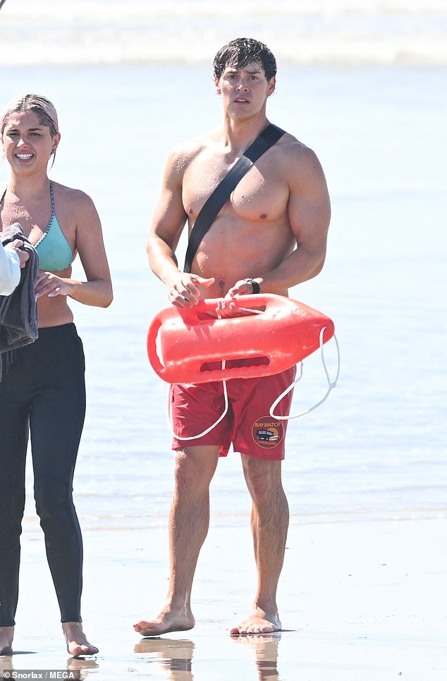 Noah showed off his impressive tan and physique