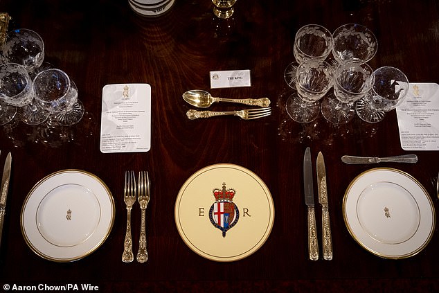 The King's place set at the table, as marked by his place card