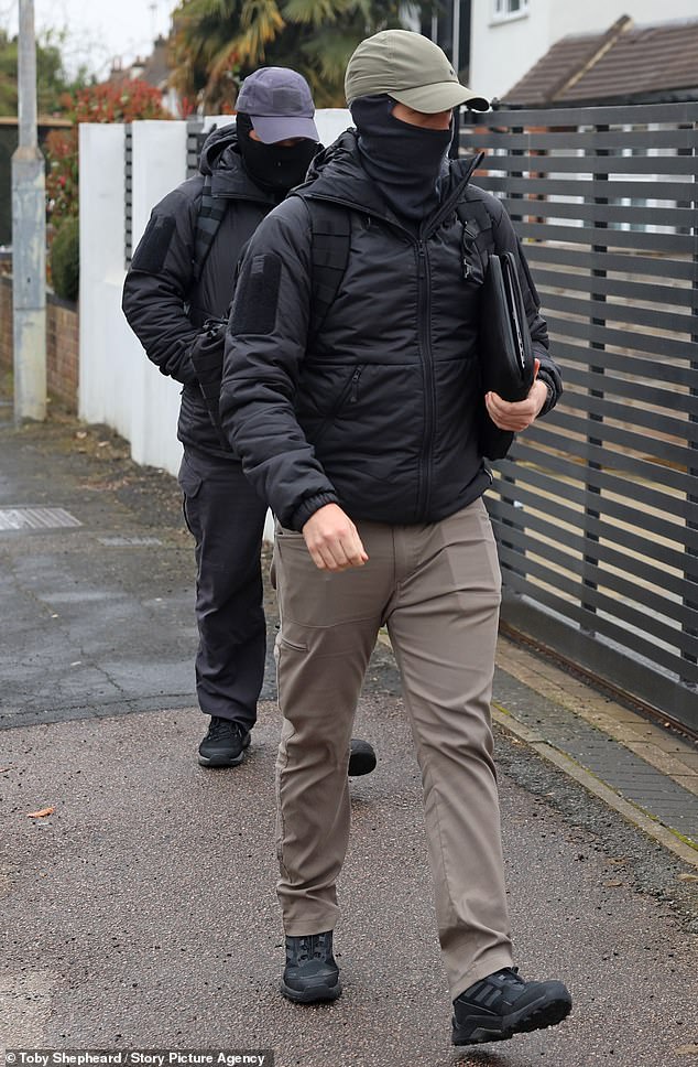 The suspects have not been accused of any specific attack plot, but officers believe their actions were part of a longer-term plan by Tehran to target the Jewish community in London. Pictured: Police at the property in Watford