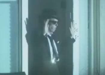 Trans woman dressed like a Blues Brother 'murders millionaire property developer' before hours long stand off with cops