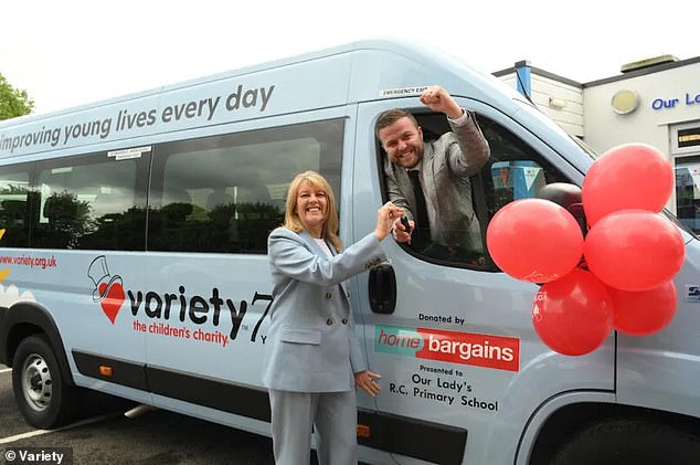 The tycoon's wife, Kristina, was sent do the honours at a ceremony when the company, TJ Morris, gifted a minivan to a Wigan primary school for children with special needs