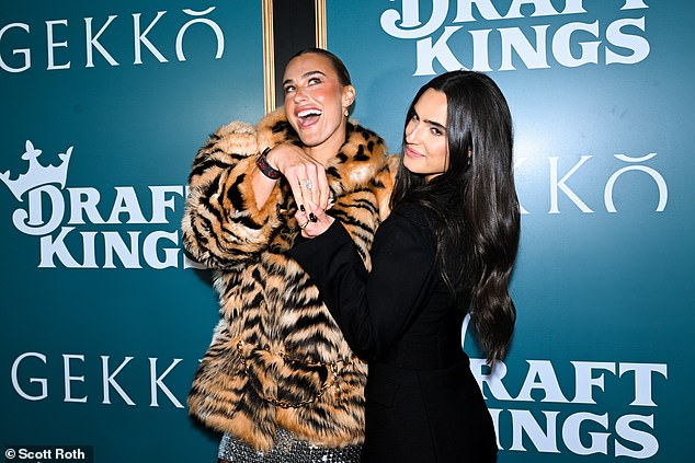 The Belarusian star looked fierce in a $48,000 tiger-print fur coat from Gucci