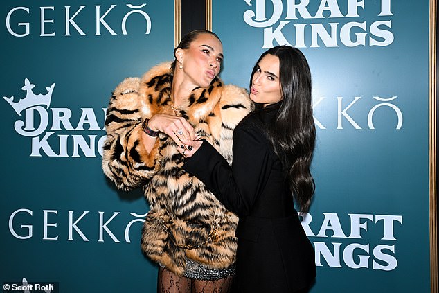 The World No 1 flashed her huge diamond engagement ring as she posed with Isabela Grutman, the wife of Gekko co-owner David Grutman