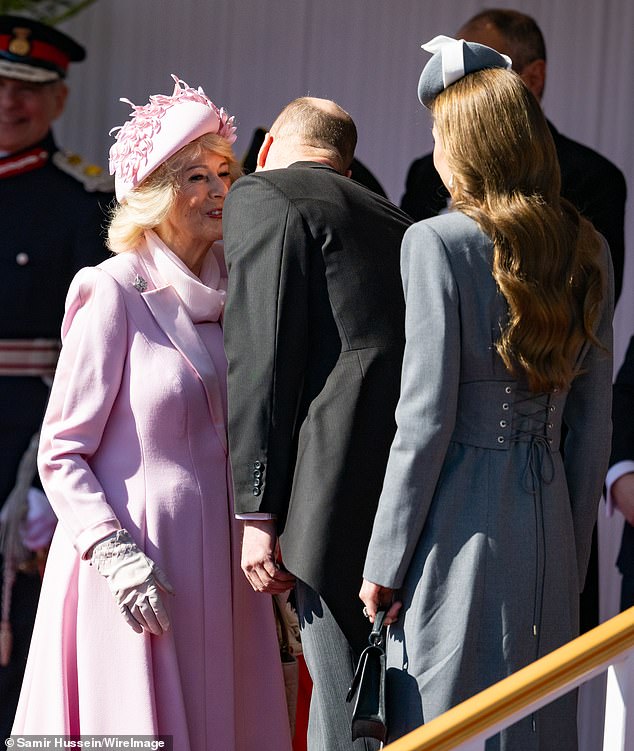 Showing his affection for his stepmother, William greeted Camilla with a kiss as he and Kate met with the King and Queen
