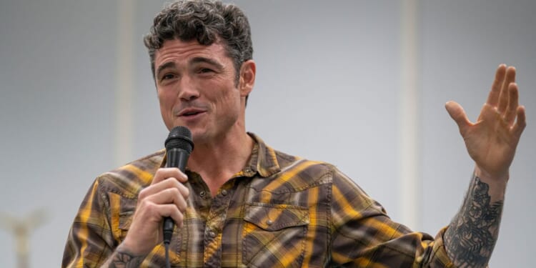 Republican congressional candidate Joe Kent speaks at a campaign event on Oct. 5, 2022, in Morton, Washington.