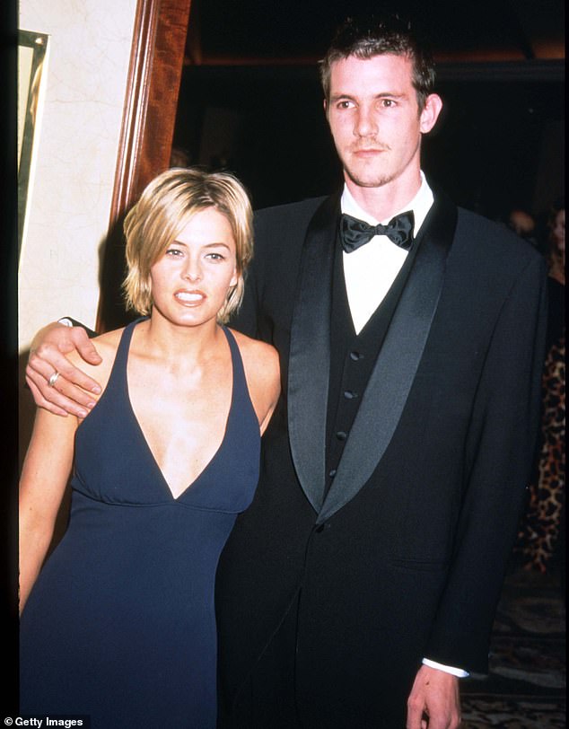 She was engaged to Canadian actor Corey Haim, but they eventually split. She has two daughters. She is pictured with ex-boyfriend Justin Herwick in 1997