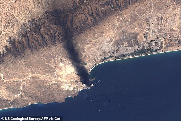 Smoke billowing from the Mina Petroleum facility at Salalah Port in Oman on Monday