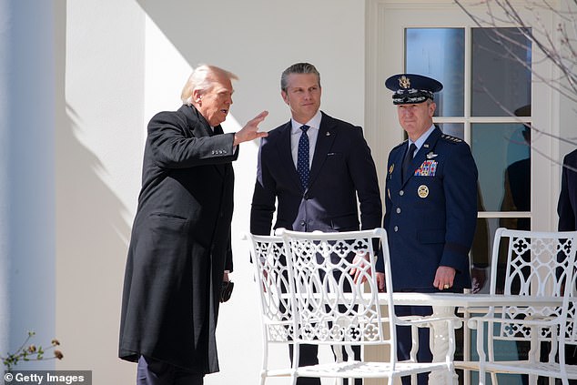 Trump speaks to Hegseth and Chairman of the Joint Chiefs of Staff General Dan Caine as he departs the White House on March 18