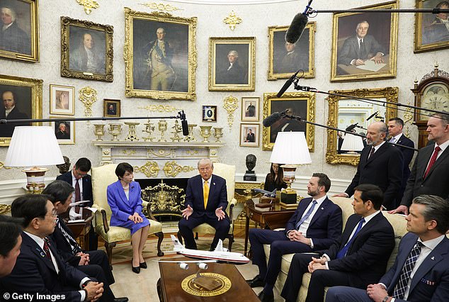 President Donald Trump (right) holds court in the Oval Office alongside Japanese Prime Minister Sanae Takaichi (left) on Thursday