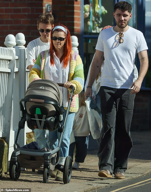Alfie was pictured yesterday with Zoe's brother Joe and his partner Diane Buswell and their newborn son Bowden