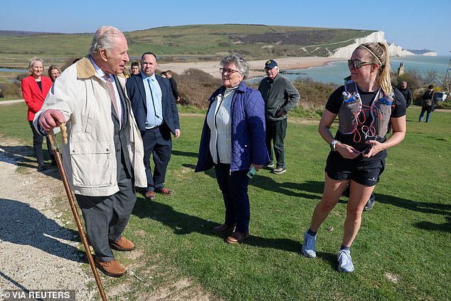 Several members of the public gasped 'Is that actually the King?' when they noticed him walking through the Seven Sisters National Nature Reserve in East Sussex this morning