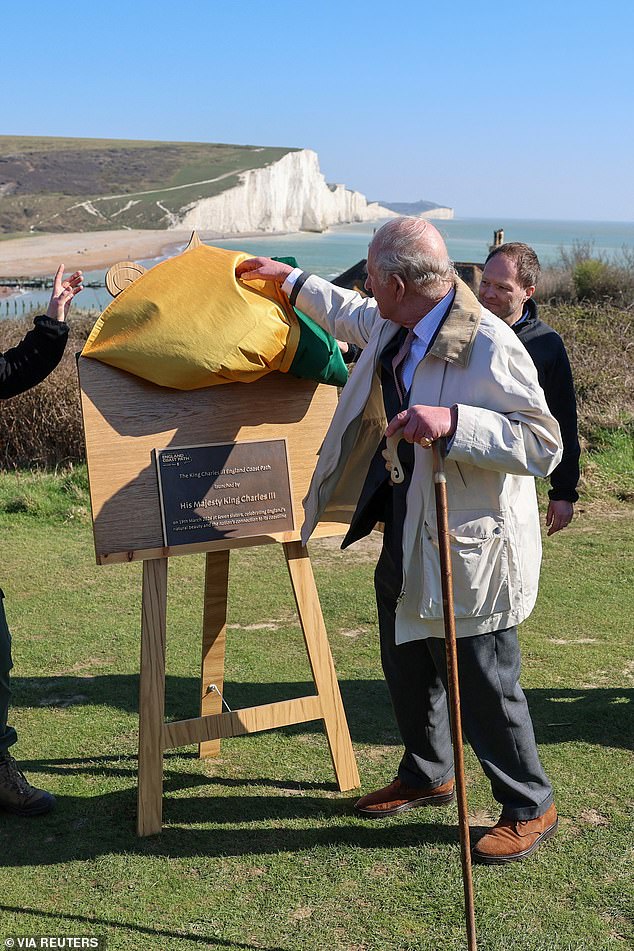 He unveiled two plaques en route, joking that the latter - on a windy clifftop - might unveil itself if the breeze on the cloth covering it continued