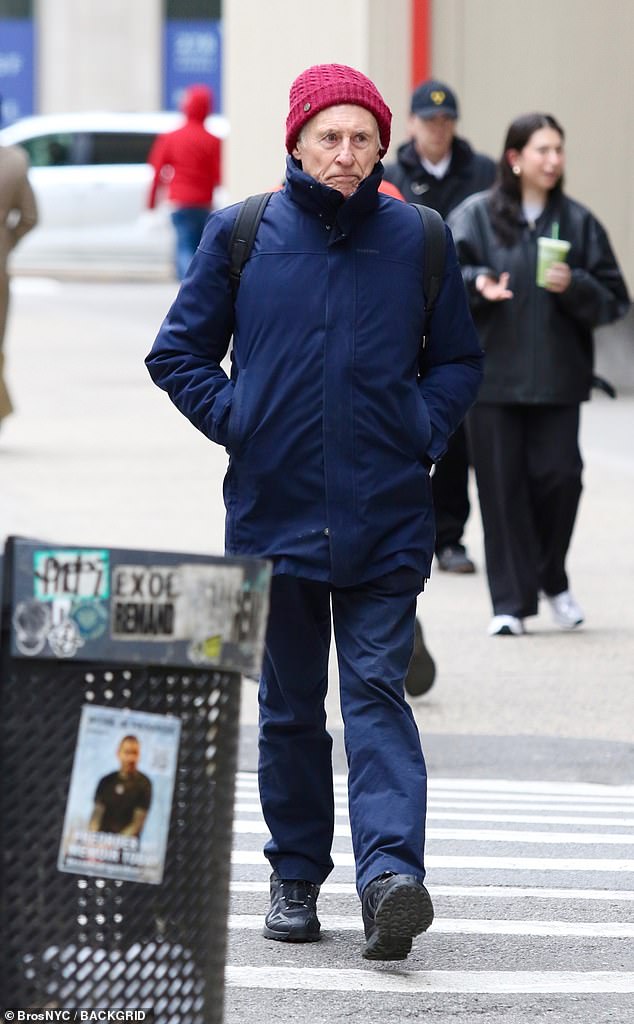 Byrne also donned a pair of navy blue trousers as he walked around in a pair of black Salomon sneakers