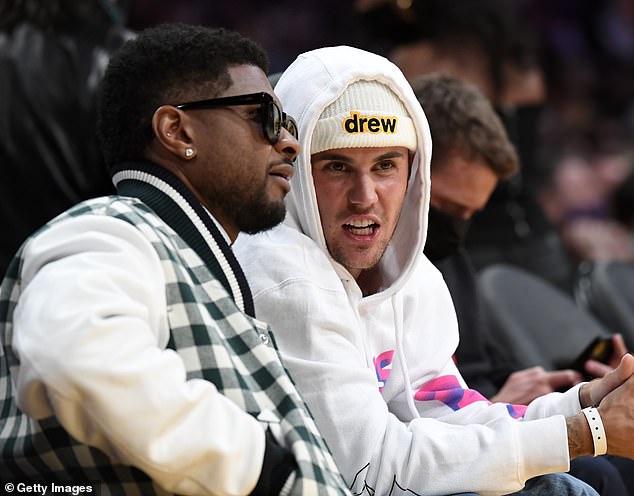 Bieber and Usher were seemingly last pictured together back in 2021 as they attended a Lakers game in Los Angeles (seen above)
