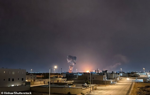 Saudi Arabia threatened Iran with military action as it claimed any trust with Tehran had been 'shattered' after Riyadh was targeted by ballistic missiles. (Pictured: Saudi air defences intercept missiles in the capital on Wednesday)