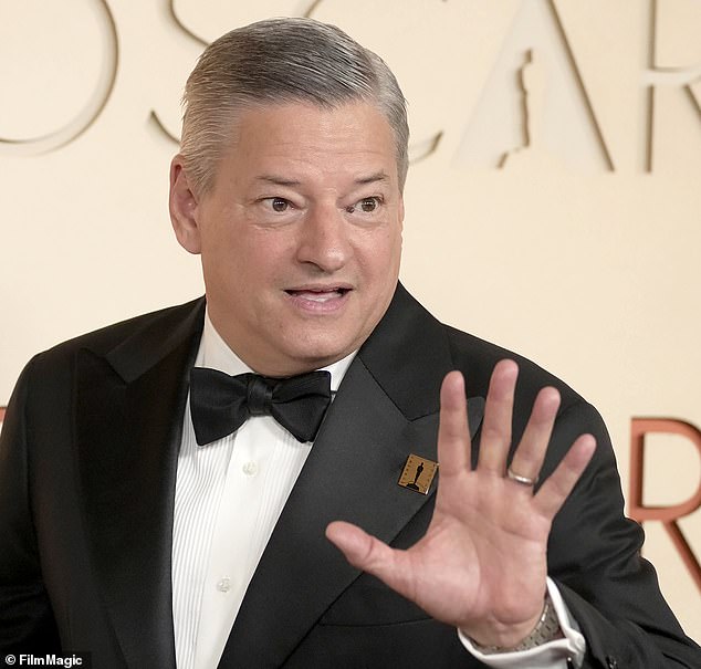 Netflix boss Ted Sarandos (pictured) is said to be 'fed up with the pair', according to the piece