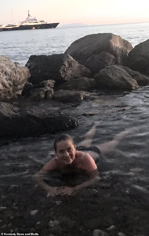 Rose was reportedly underwater for five minutes and it was another 13 minutes before people managed to resuscitate her. Pictured: Rose swimming in the sea before she died