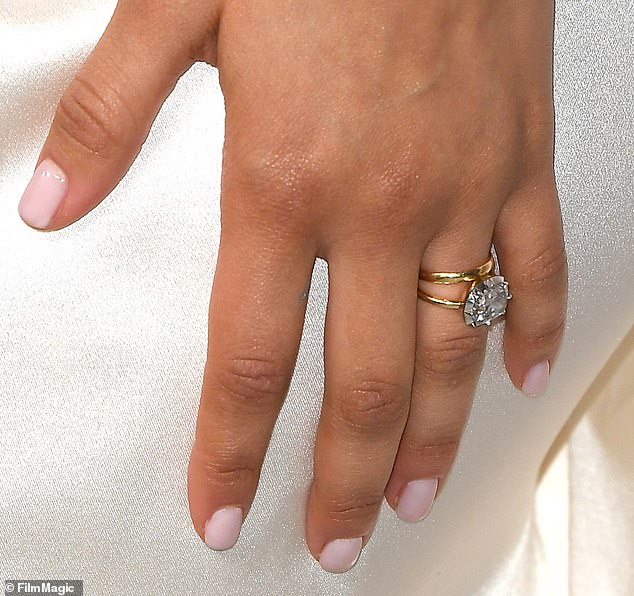 During the press tour the actress has shown off a gold band on her wedding finger but has refused to confirm her marital status
