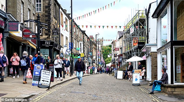 Skipton's high street. With its spectacular surrounding landscape and its well-preserved castle, Skipton is already a family holiday haven for northerners and the market town is becoming an increasingly popular place to settle down