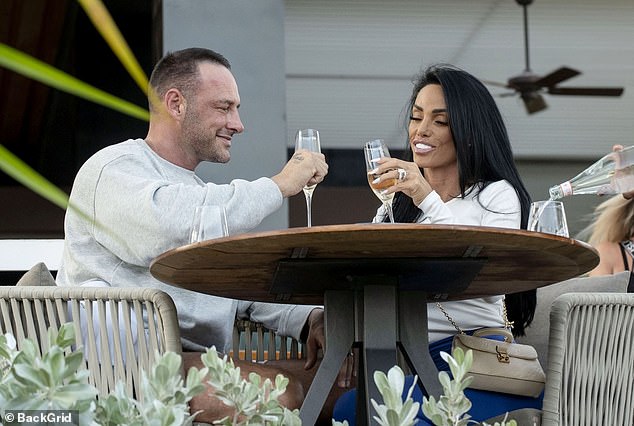 Meanwhile Lee wore a baggy grey jumper with shorts and a baseball cap for their romantic outing