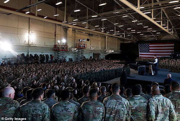 Vice President JD Vance spoke to troops based at Fort Campbell in Kentucky in November. Vance's approval rating hasn't taken a hit since the advent of the Iran war, and he's now more popular than President Donald Trump