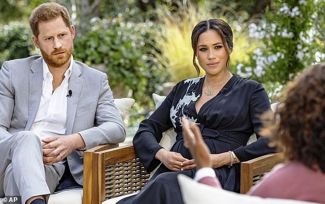 Harry and Meghan during an interview with Oprah Winfrey in 2021. 'There is no disgrace in going to America, giving it your best shot, and then jacking it in,' says Boris
