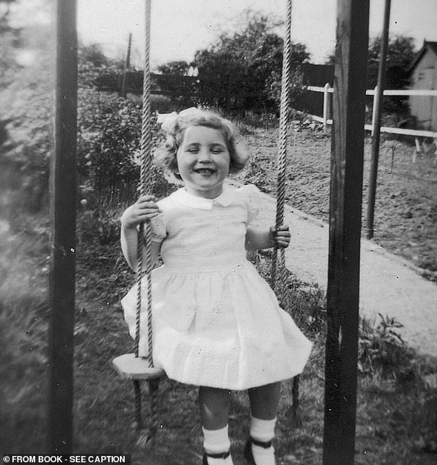 A picture of Jenni as a child in her Coronation frock