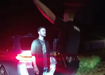 Moment Justin Timberlake is cuffed after singer fails sobriety tests during drink driving arrest as body cam released