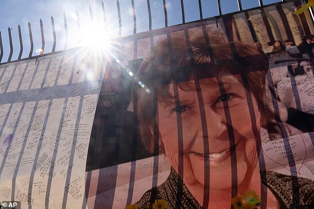 A banner with notes from hundreds of well-wishers and an image of Nancy Guthrie
