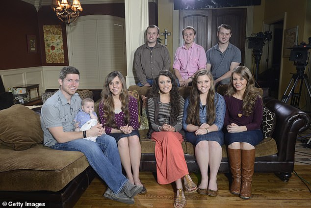 The 19 Kids And County star is now facing additional charges including four counts of second-degree endangering the welfare of a minor and four counts of second-degree false imprisonment, the Tontitown Police Department told TMZ; Duggar seen above top far right