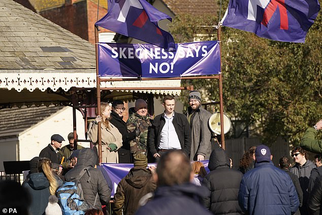 Laura Towler, Mark Collett, Joe Marsh, Wesley Russell and Sam Melia on stage during a protest by nationalist group Patriotic Alternative in Tower Gardens in Skegness, Lincolnshire in 2023