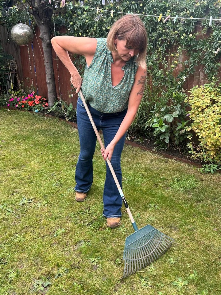 Veronica Lorraine raking a lawn.